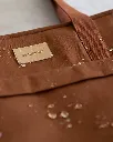 nobodinoz-waterproof-changing-bag-baby-on-the-go-clay-brown-organic-cotton-diaper-changing-bags_112214.webp