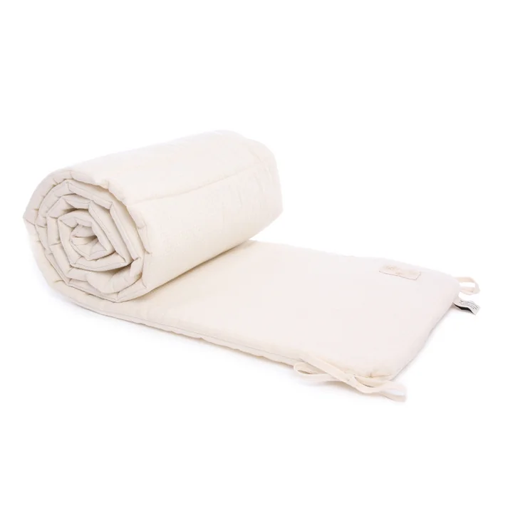 Nobodinoz-Nest-Babybett-Umrandung-mit-Wabenstruktur-natural.webp